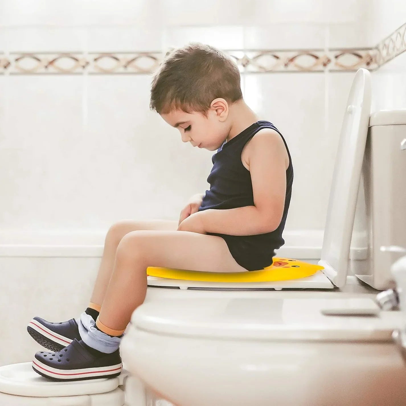 Hopfällbar toalettstol för potträning