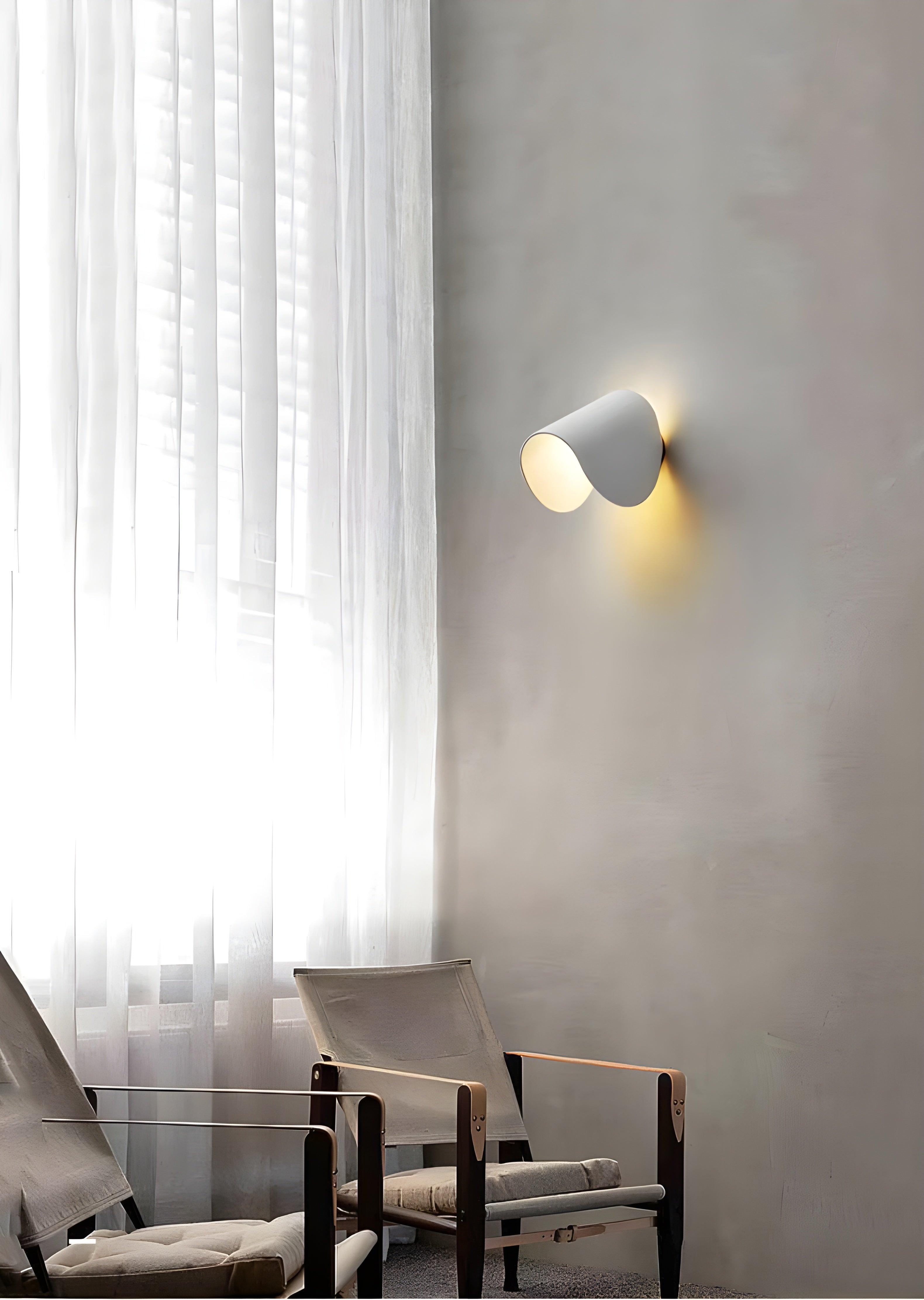 Arcella | Dimbar LED-vägglampa i kurvig design för varmt ambientljus