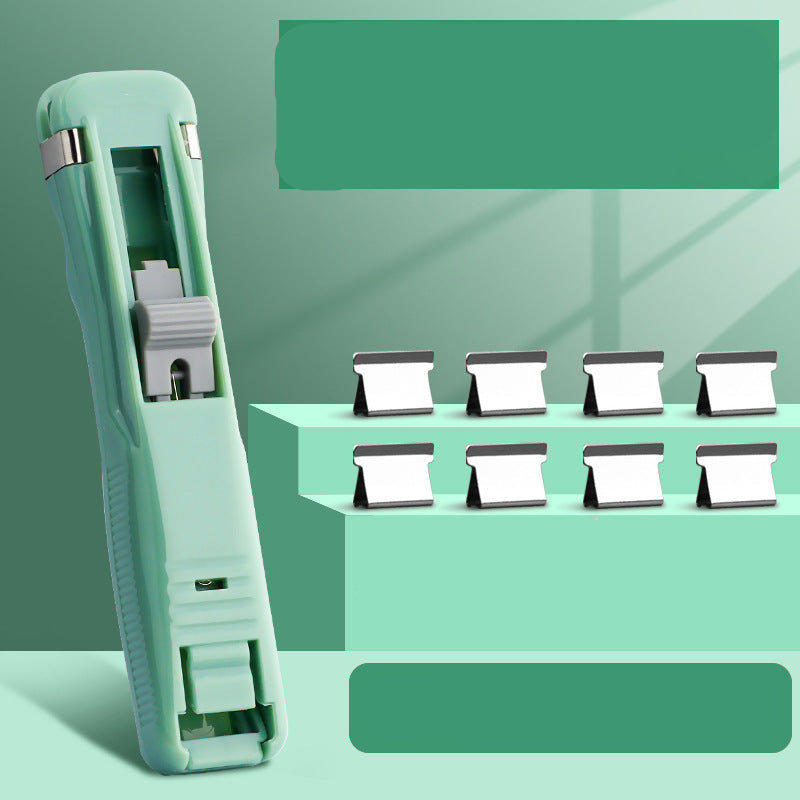 Återanvändbar pappersklämmemaskin