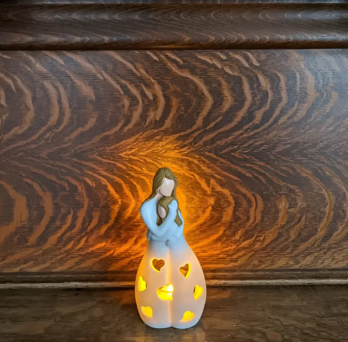 Symbolisk mor-och-barn-ljusstake