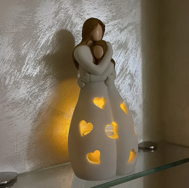 Symbolisk mor-och-barn-ljusstake