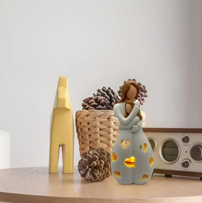 Symbolisk mor-och-barn-ljusstake