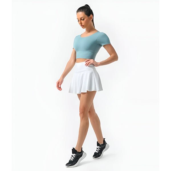 FLEXMOVE KJOL – Sportig kvinnkjol med inbyggda shorts för aktiva dagar