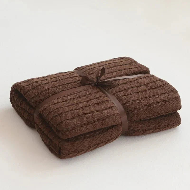 Stickad bomull enfärgad pläd för mysigt bekvämlighet