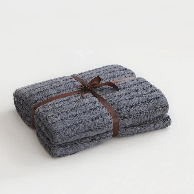 Stickad bomull enfärgad pläd för mysigt bekvämlighet