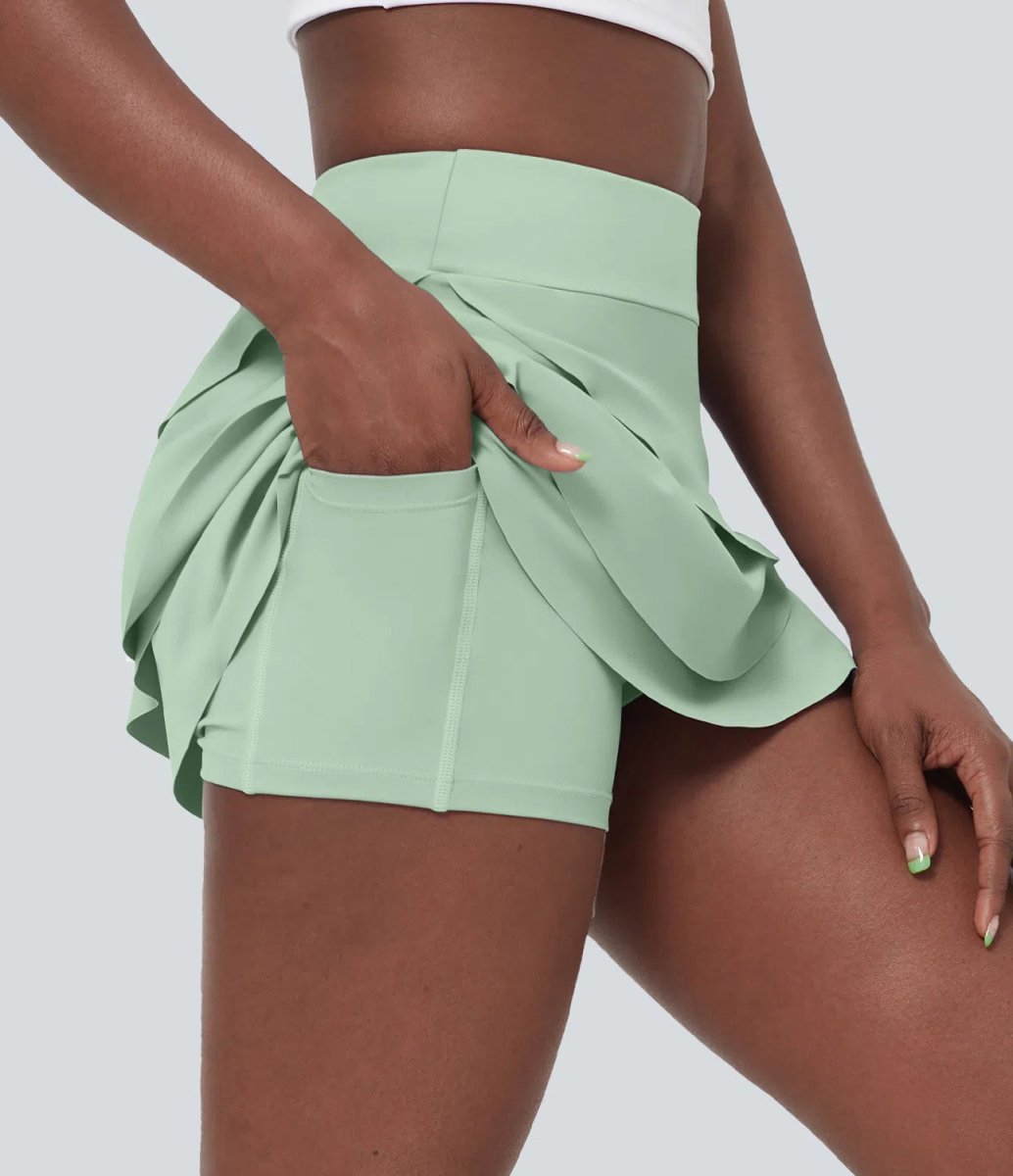 MARIPOSA Golfkjol - Feminin lagerlook med integrerade shorts