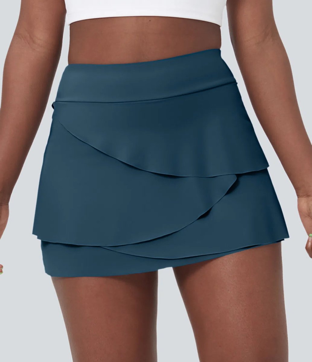 MARIPOSA Golfkjol - Feminin lagerlook med integrerade shorts