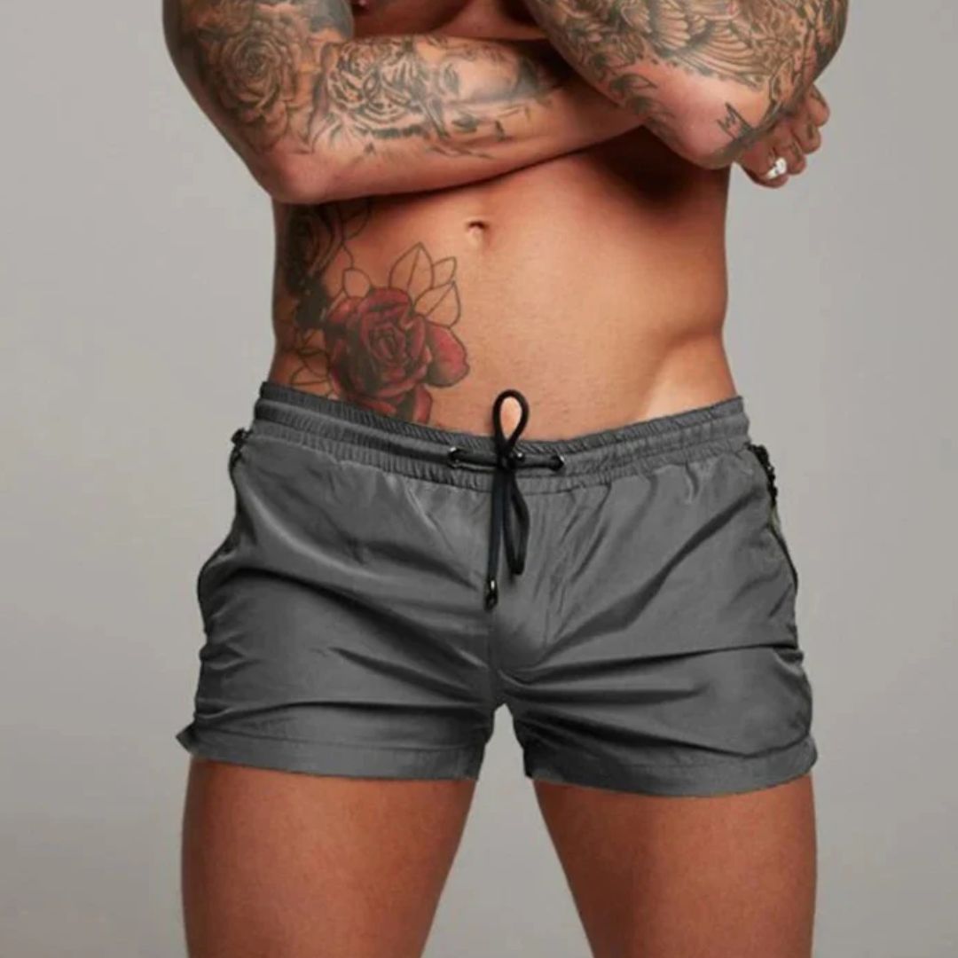 TIDEFLEX SHORTS – Snabbtorkande herrbadshorts med stretchmaterial