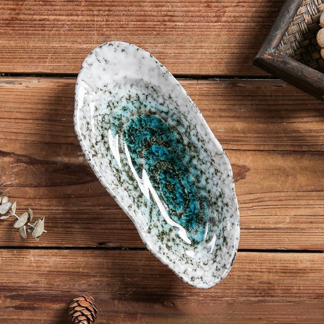 Shellora – Elegant, muschelformad keramikservis för stilig matlagning