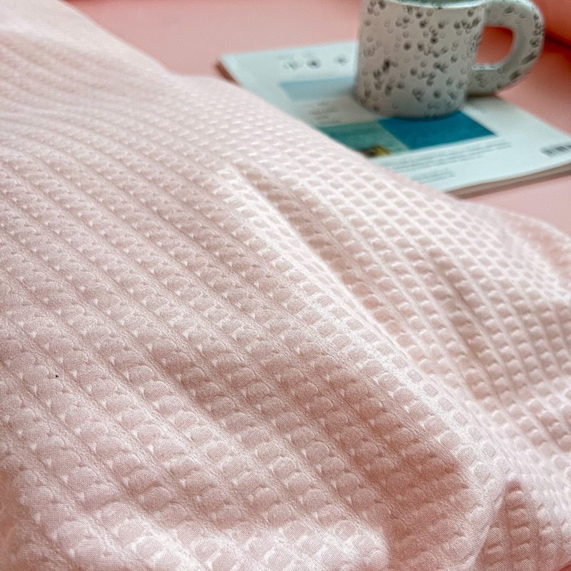 Enkelpastellfärgad sängklädset