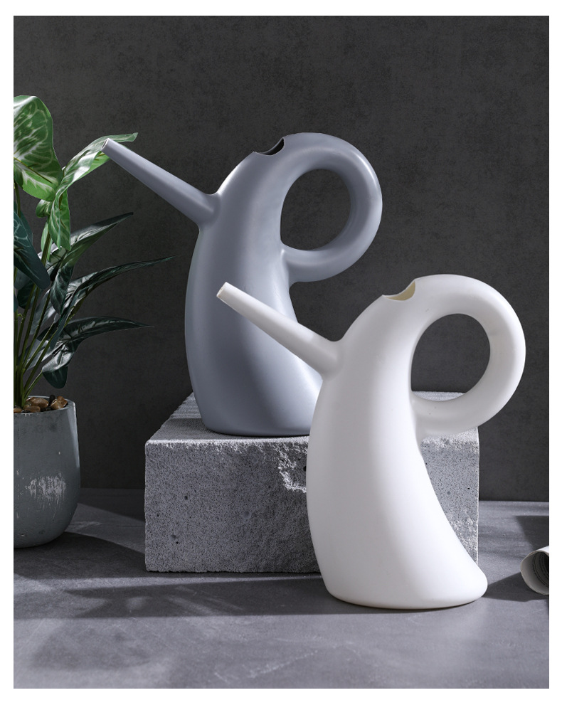 Vattendosa med förlängd kran – Elegant design för exakt vattning