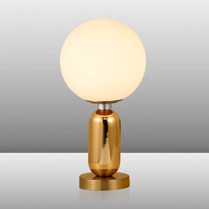 GloBelle - Modern glasklotformad lampa med gyllene metallfot