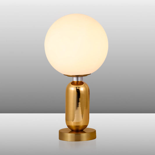 GloBelle - Modern glasklotformad lampa med gyllene metallfot