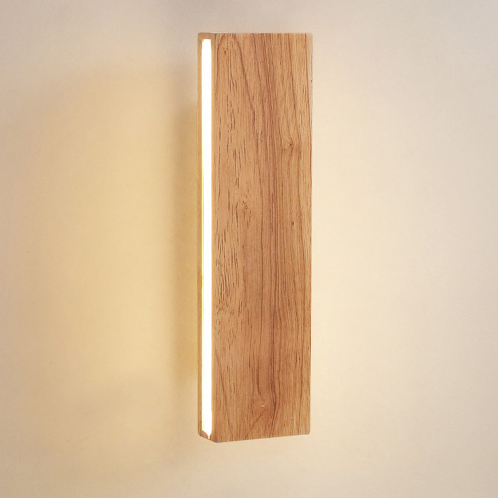 Vägglampa med roterbar trä-LED-design