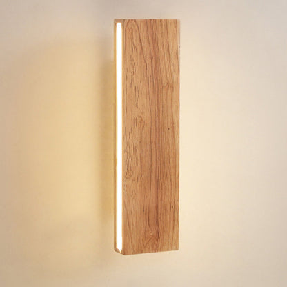 Vägglampa med roterbar trä-LED-design