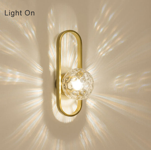 Ljuscirkel - Modern vägglampa med glaskula och cirkulärt design