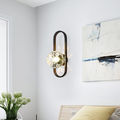 Ljuscirkel - Modern vägglampa med glaskula och cirkulärt design