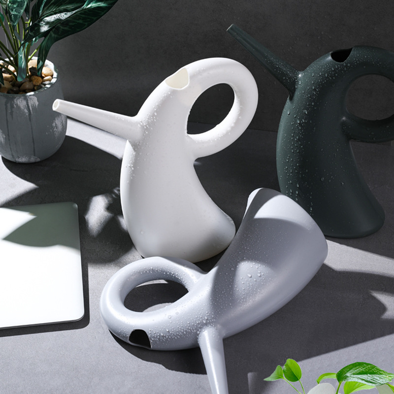 Vattendosa med förlängd kran – Elegant design för exakt vattning