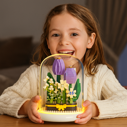 Elegant byggstenblomma i ett glas