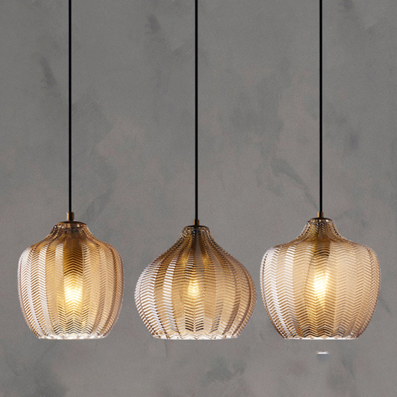 Modern glas hänglampa med vågformad skugga för matrum