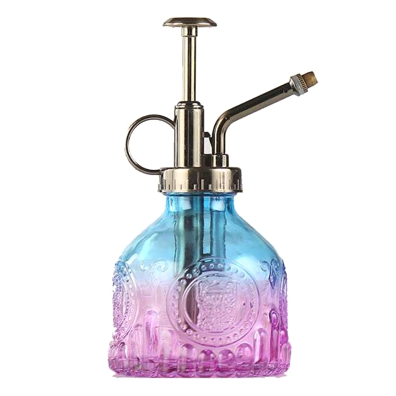 Präglad glasflaska med metallmunstycke – växtspruta för blommabesträckning i vintage-design