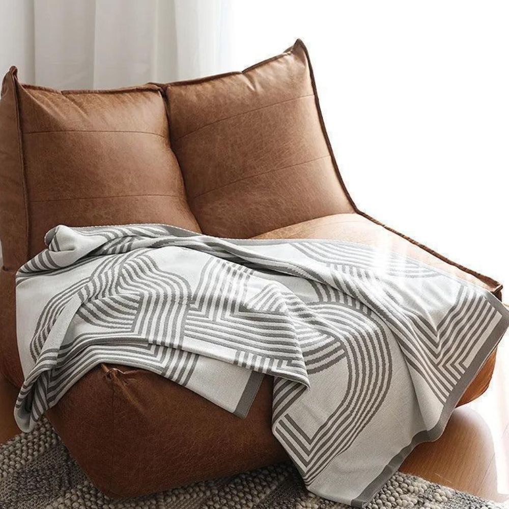 Snuggle Maze Stickad Filt