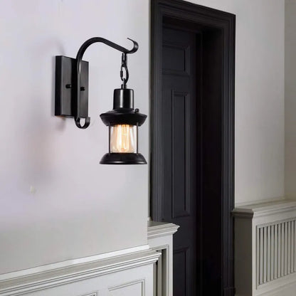 Vägglampa med vintage glaslampa-design