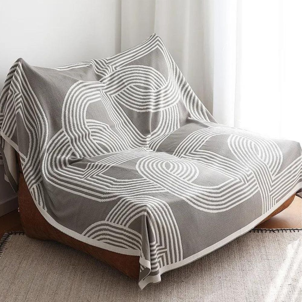 Snuggle Maze Stickad Filt