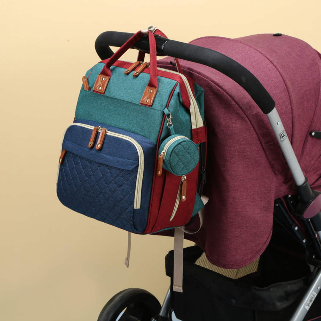 Mångfunktionell Babyblöjryggsäck med sovutrymme