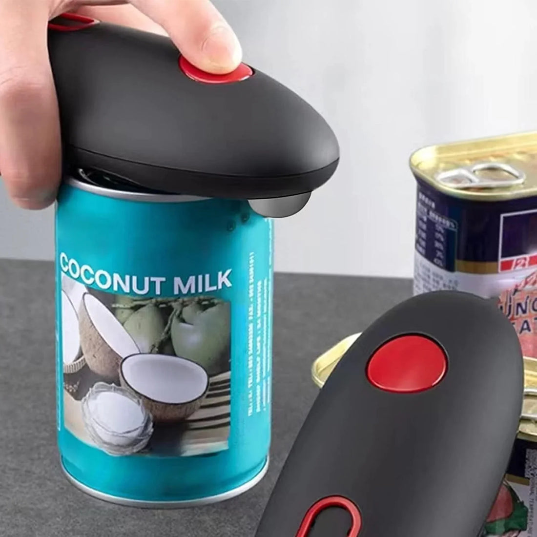 Automatisk burköppnare med ergonomiskt handtag och en-knapps betjening