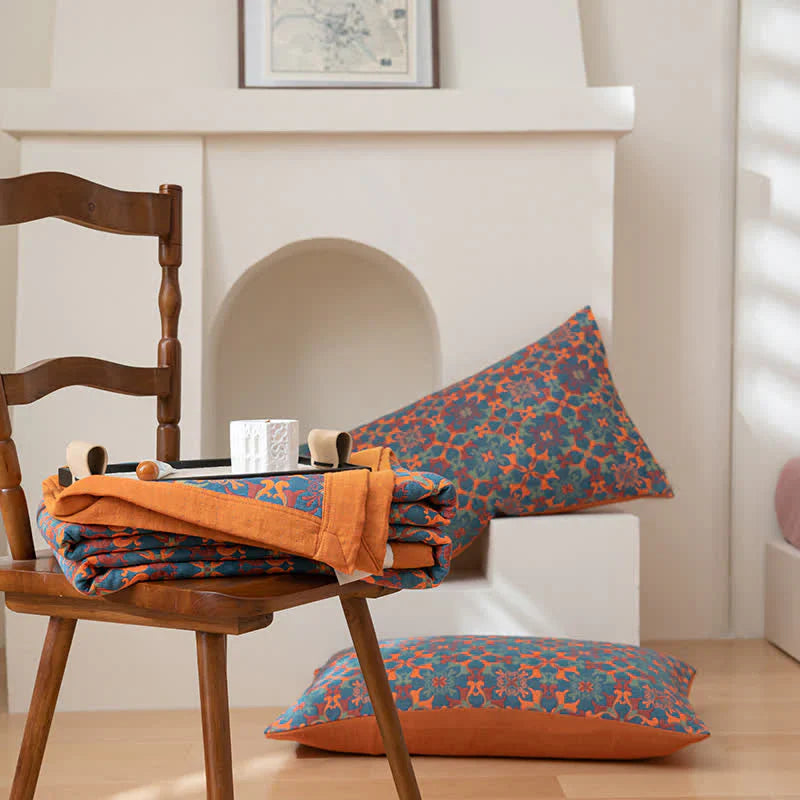 Sexlagig bomullsfilt med orange-blått mönster