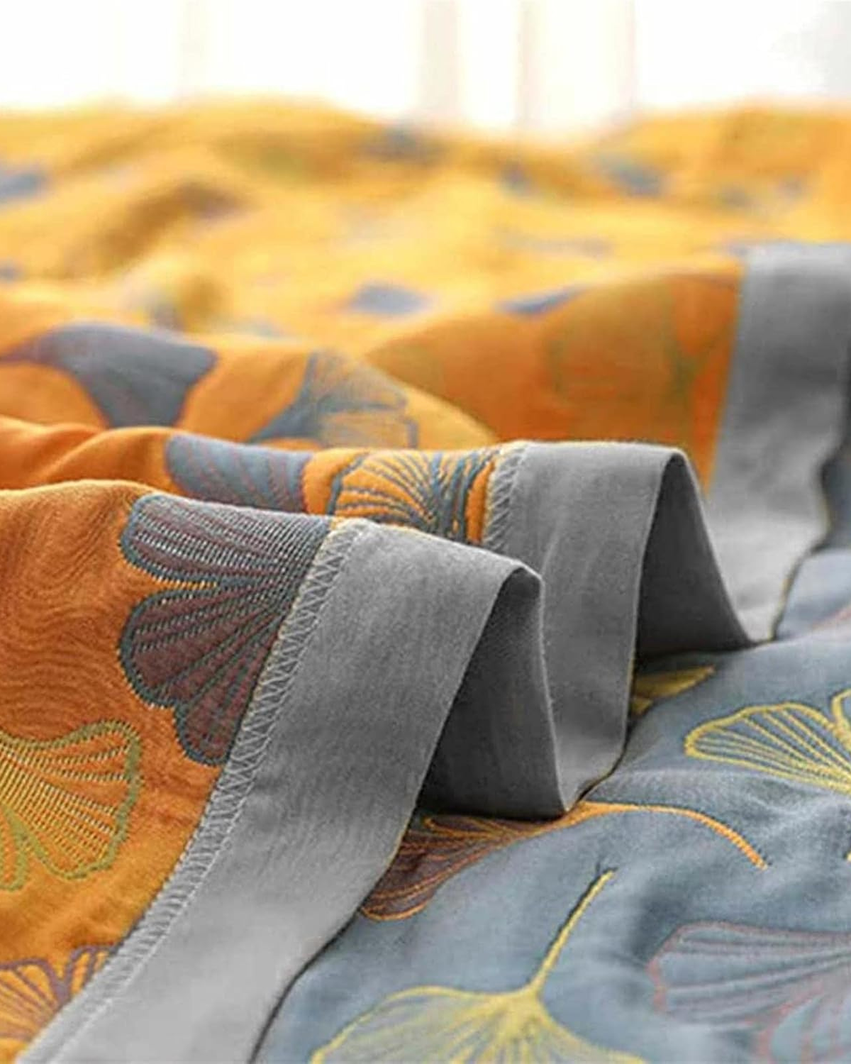 Carvallo – Lyxig bomullsfilt med fint lövmönster för värme och stil