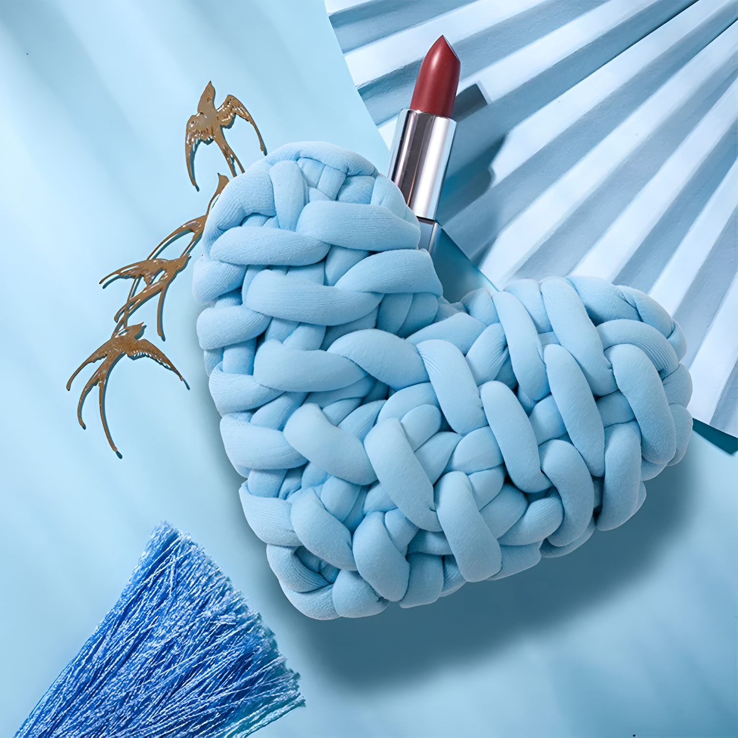 Plush knotted heart-shaped cushions