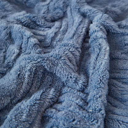 Oregelbundet rutigt randigt puffade sammetsoffatäcke