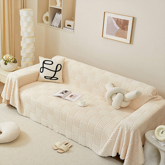 Oregelbundet rutigt randigt puffade sammetsoffatäcke