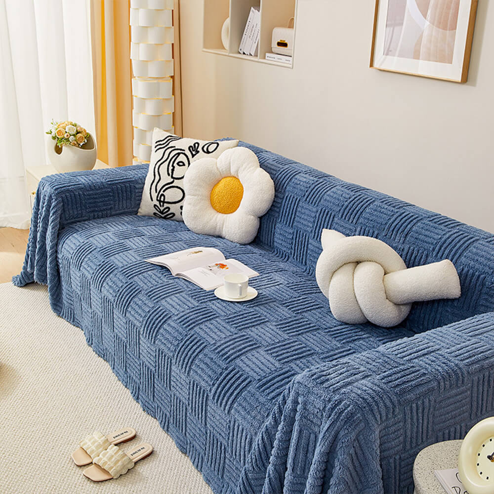 Oregelbundet rutigt randigt puffade sammetsoffatäcke