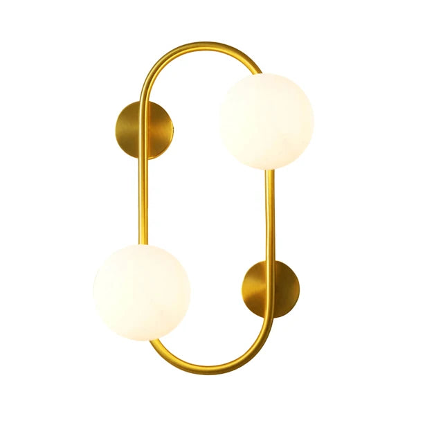 LuminoSphere - Modern mässingsvägglampa med glasbollar