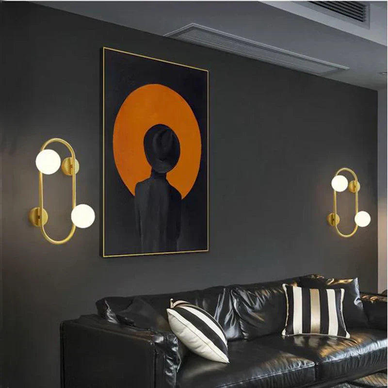 LuminoSphere - Modern mässingsvägglampa med glasbollar