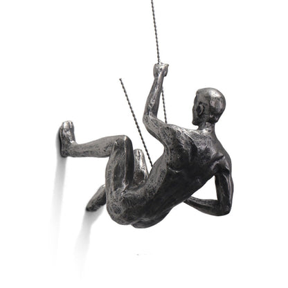 ArtiClimb Väggfigur | Klättrande skulptur i konstharp