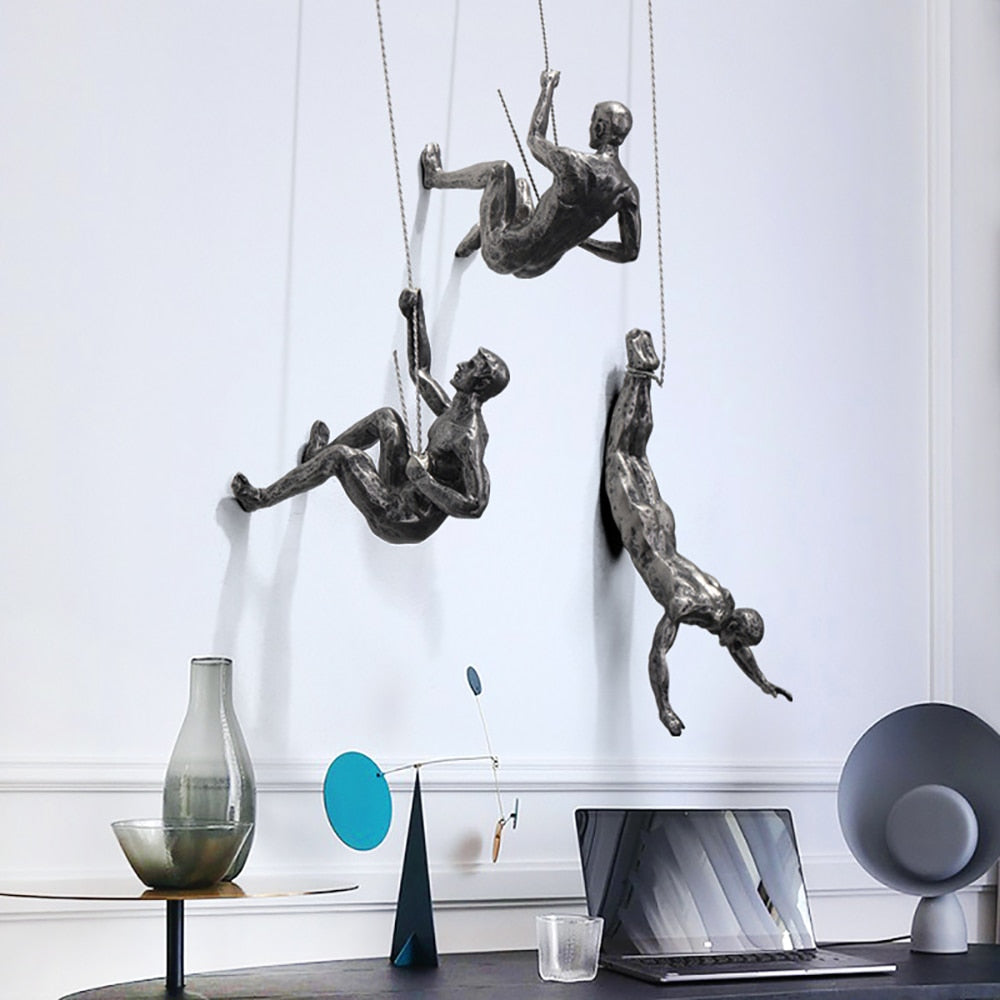 ArtiClimb Väggfigur | Klättrande skulptur i konstharp