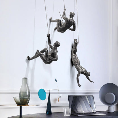 ArtiClimb Väggfigur | Klättrande skulptur i konstharp