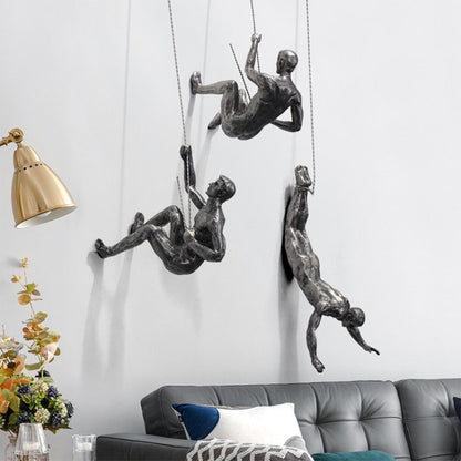 ArtiClimb Väggfigur | Klättrande skulptur i konstharp