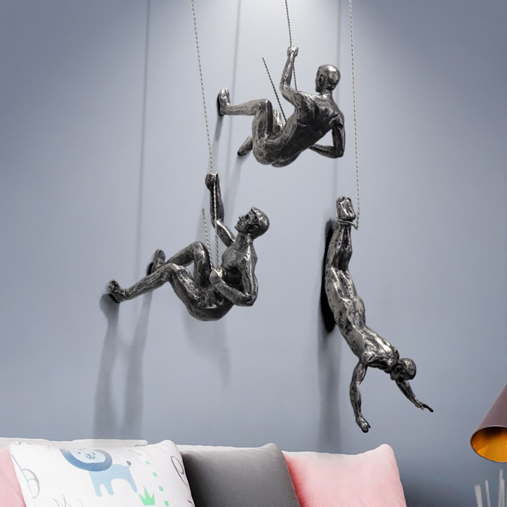 ArtiClimb Väggfigur | Klättrande skulptur i konstharp