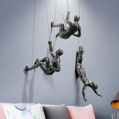 ArtiClimb Väggfigur | Klättrande skulptur i konstharp