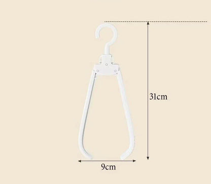 Praktisk ihopvikbar klädhängare