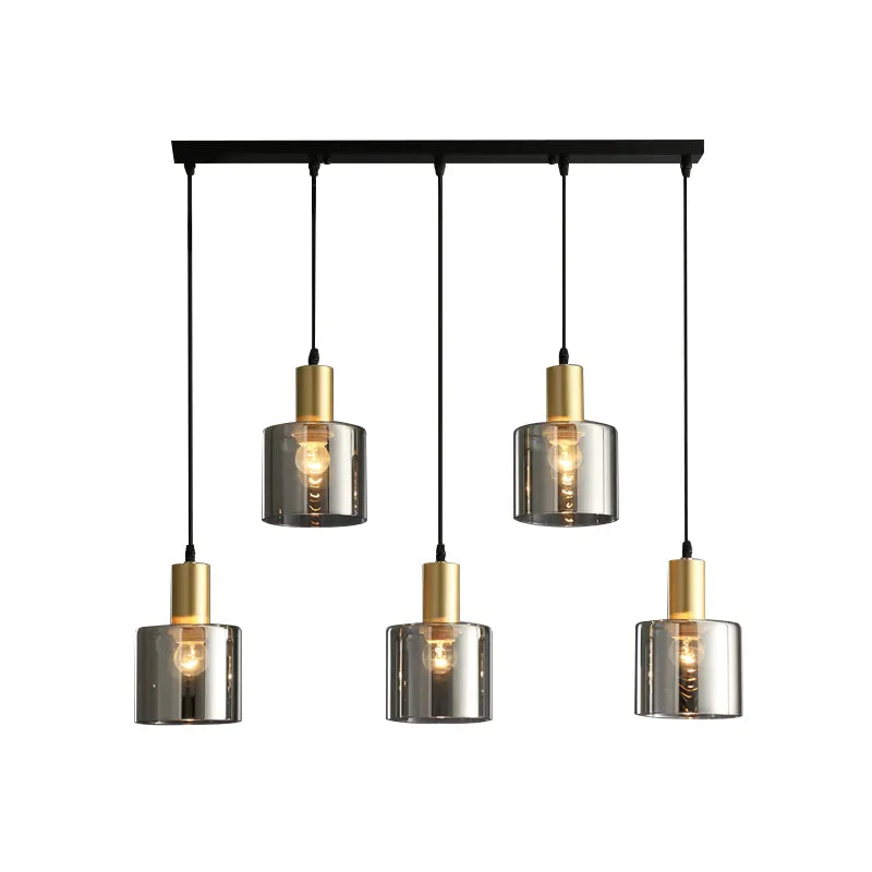 Lotte Taklampa – Modern taklampa i svart och guld med rökt glas, stilfull för samtida interiörer