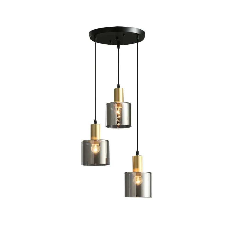 Lotte Taklampa – Modern taklampa i svart och guld med rökt glas, stilfull för samtida interiörer