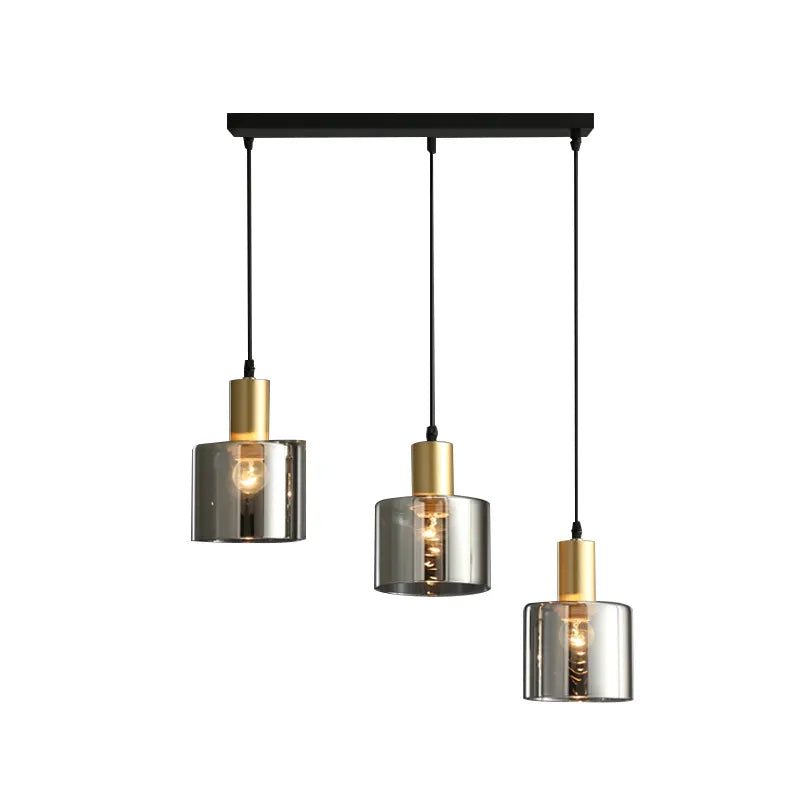 Lotte Taklampa – Modern taklampa i svart och guld med rökt glas, stilfull för samtida interiörer