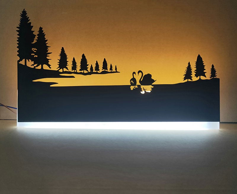 Vägglampa med mångsidig design