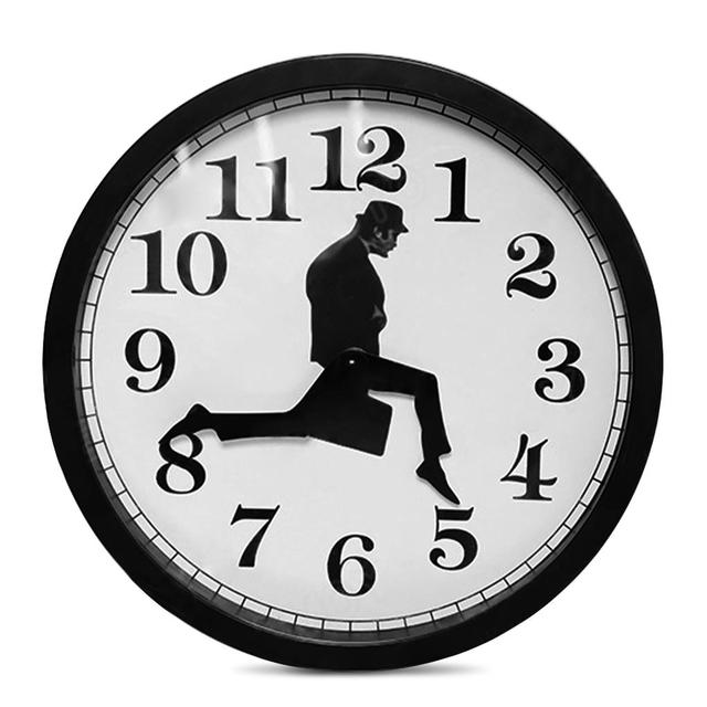 Carvallo – Kreativt väggur med unik illustration av rörlig man och coola siffror